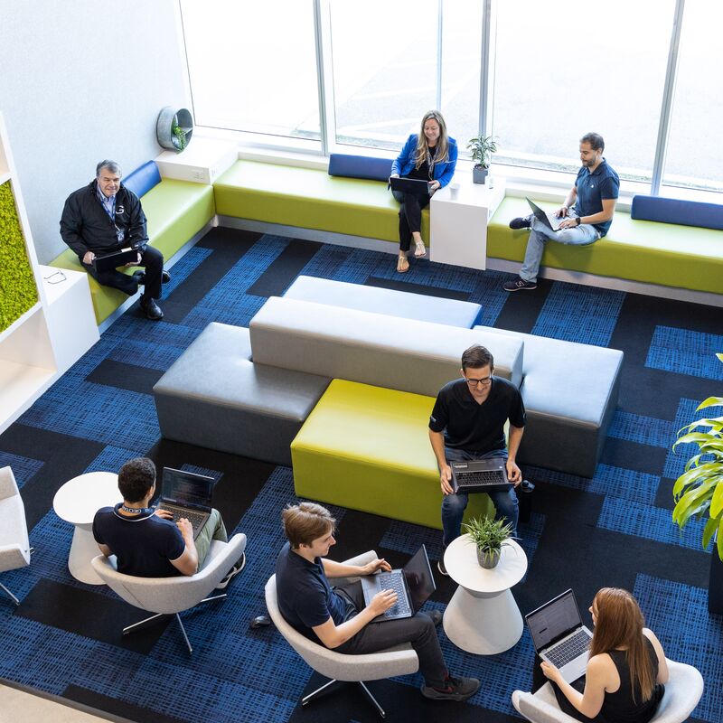 Many people work together in the Geotab office